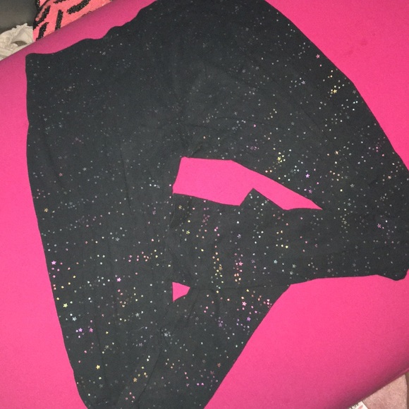 I’m selling black leggings with rainbow stars. - Picture 2 of 3